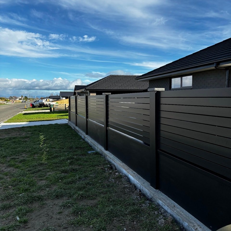 beautiful black slat fence build near palmerston north