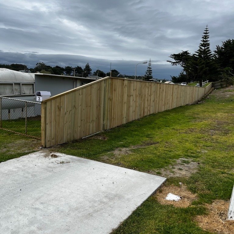 Timber picket fence by Fencing Palmerston North providing a classic touch to residential property frontage